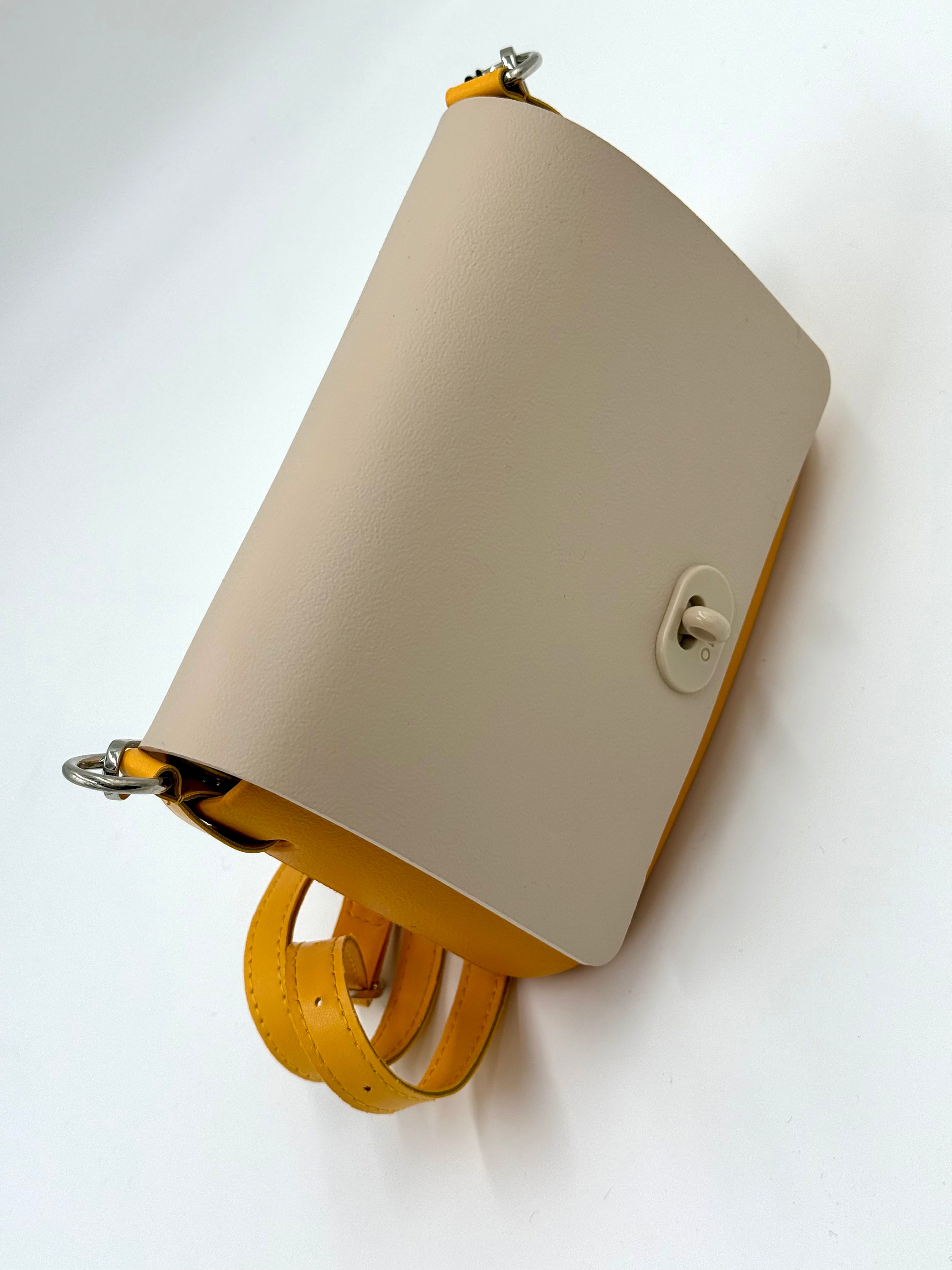 O bag pocket crossbody – lemon yellow body, off-white lid, twist lock